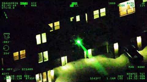 A green laser is aimed at a Colorado State Patrol airplane