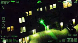 A green laser is aimed at a Colorado State Patrol airplane