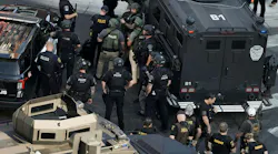 Minneapolis police respond to a high-rise apartment shooting