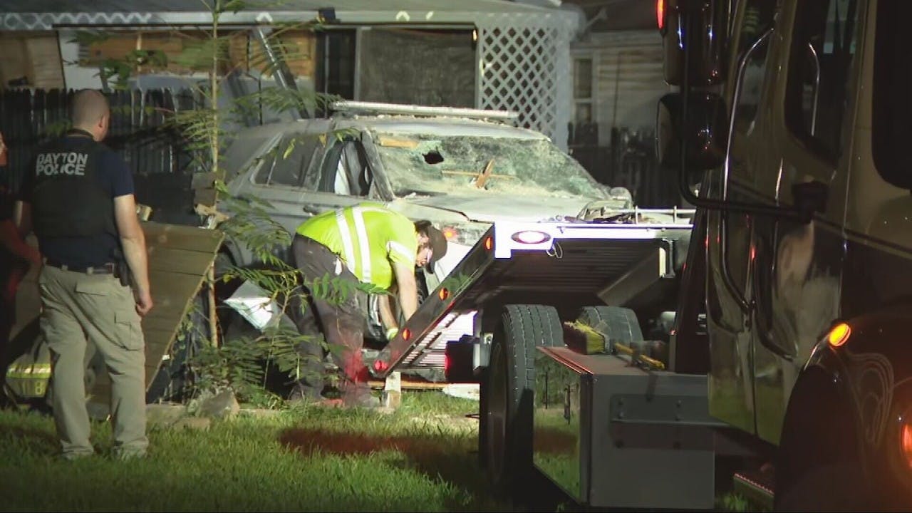 A stolen Dayton police cruiser crashed into an occupied home