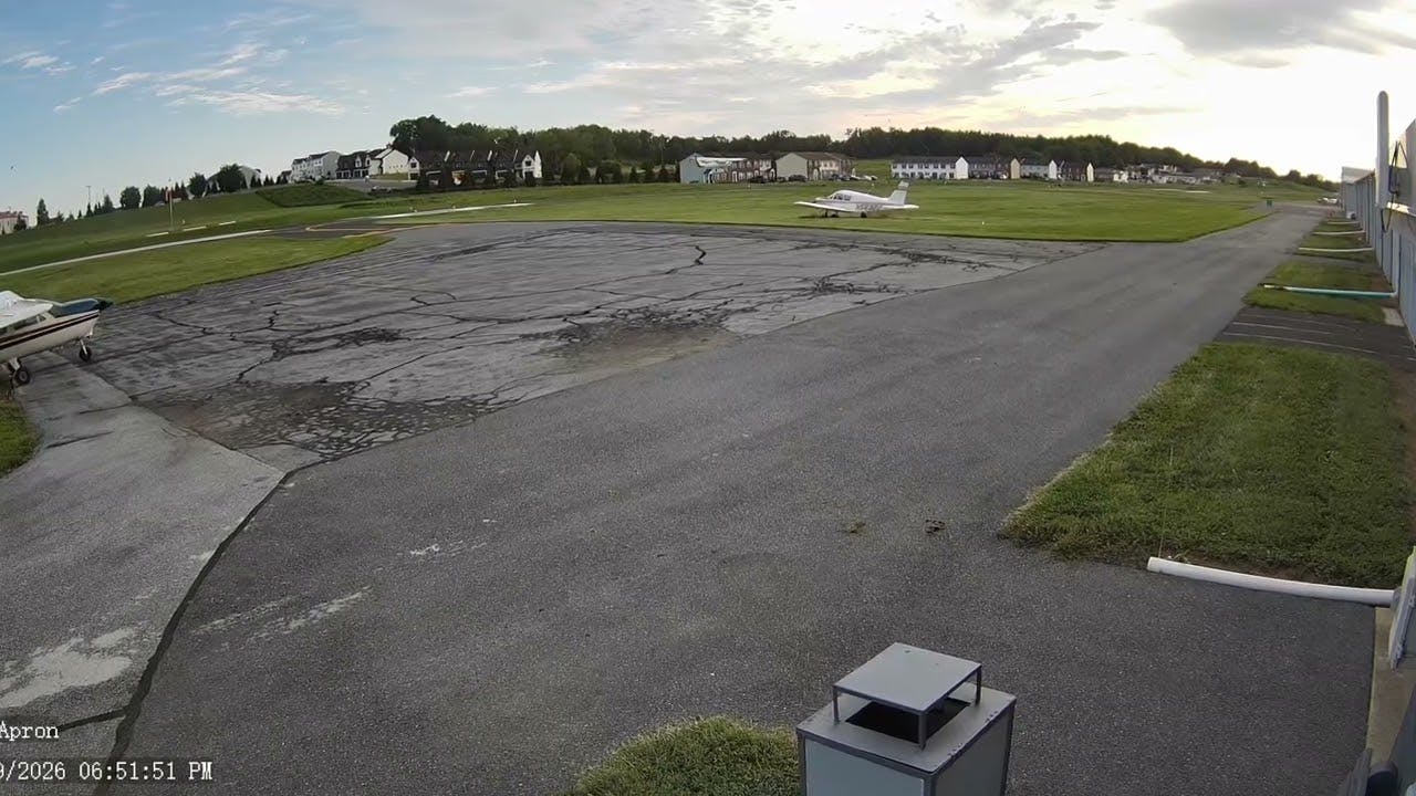 Security camera footage captured the crash between a Pennsylvania State Police helicopter and an airplane at Carlisle Airport