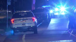 Charlotte police investigate the scene of a shooting that wounded an officer