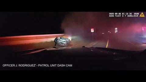 Robstown police officers pull an unconscious driver from a burning car after crash during a chase