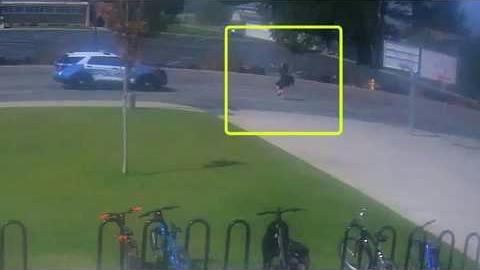 A man appears to point a gun at a Spokane Valley deputy outside a middle school