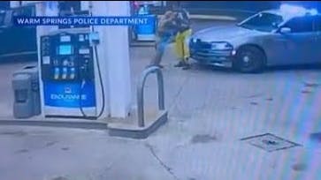 Warm Springs Police Sgt. Chris Fisher and Jimmy Steverson fight at a gas station during an Aug. 27 traff