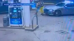 Warm Springs Police Sgt. Chris Fisher and Jimmy Steverson fight at a gas station during an Aug. 27 traff