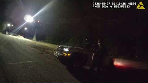 Fort Smith Police Officer Kyle Newman confronts a driver during a traffic stop