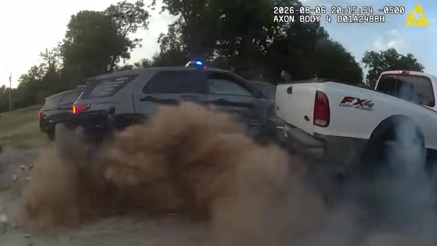A suspect in an armed domestic disturbance call rams an Oklahoma City police cruiser