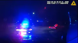 A Kenosha police officer returns fire after a homicide suspect began shooting