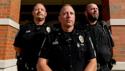 Grand Blanc Township Police Officer Jason Carpentier, Sgt. Tim Bueche and Officer Tom Whitt