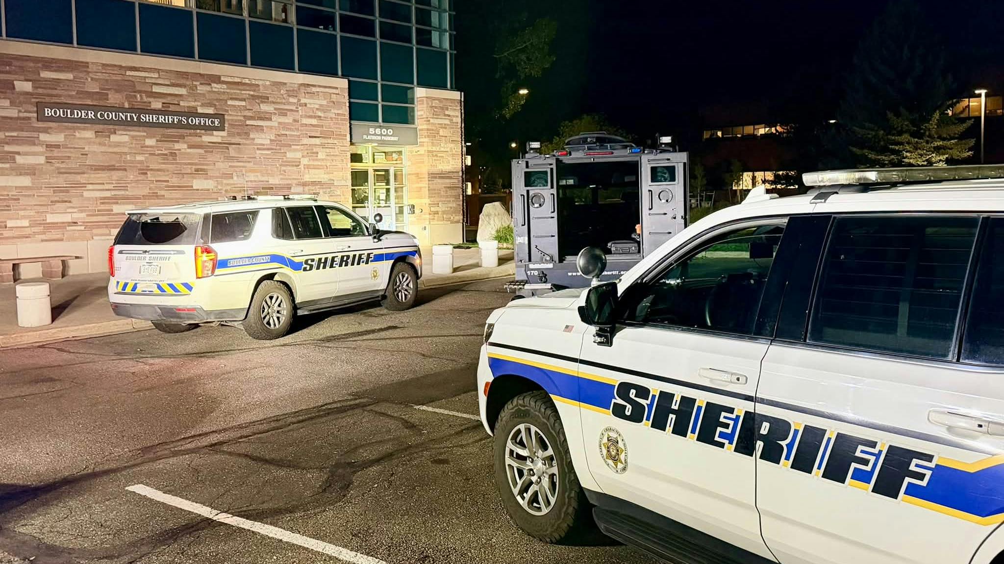 A fomer deputy was arrested after shooting at the Boulder County Sheriff's Office headquarters