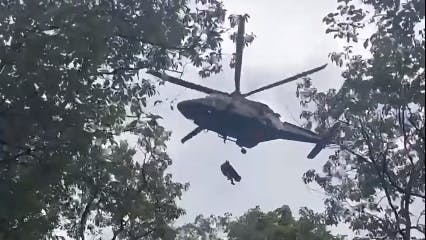 Maryland State Police aviation crews airlift and injured person after a fall from a remote tree stand