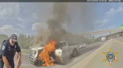 An off-duty Kansas City police detective and a Clay County deputy save a man from a burning truck