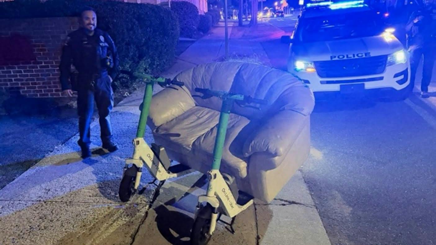 Charlotte-Mecklenburg police stop two men driving a couch mounted on electric scooters