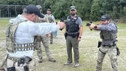 Law enforcement officers from South Carolina participate in a head-to-head dry-fire exercise