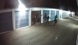Enfield police chase after suspects during an undercover sting operation