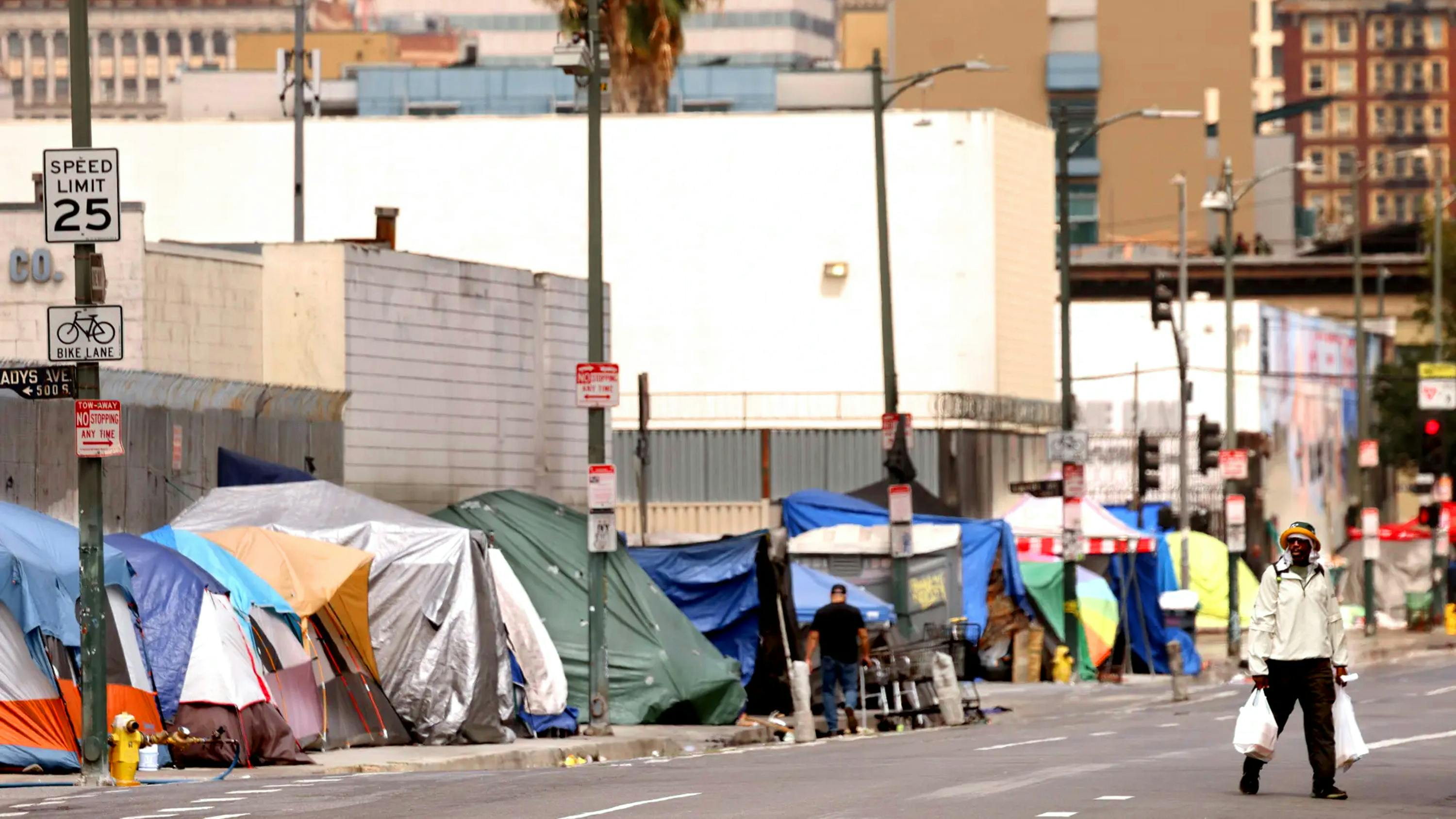 Homeless tents line 5th Street on Skid Row in downtown Los Angeles on June 25, 2026.