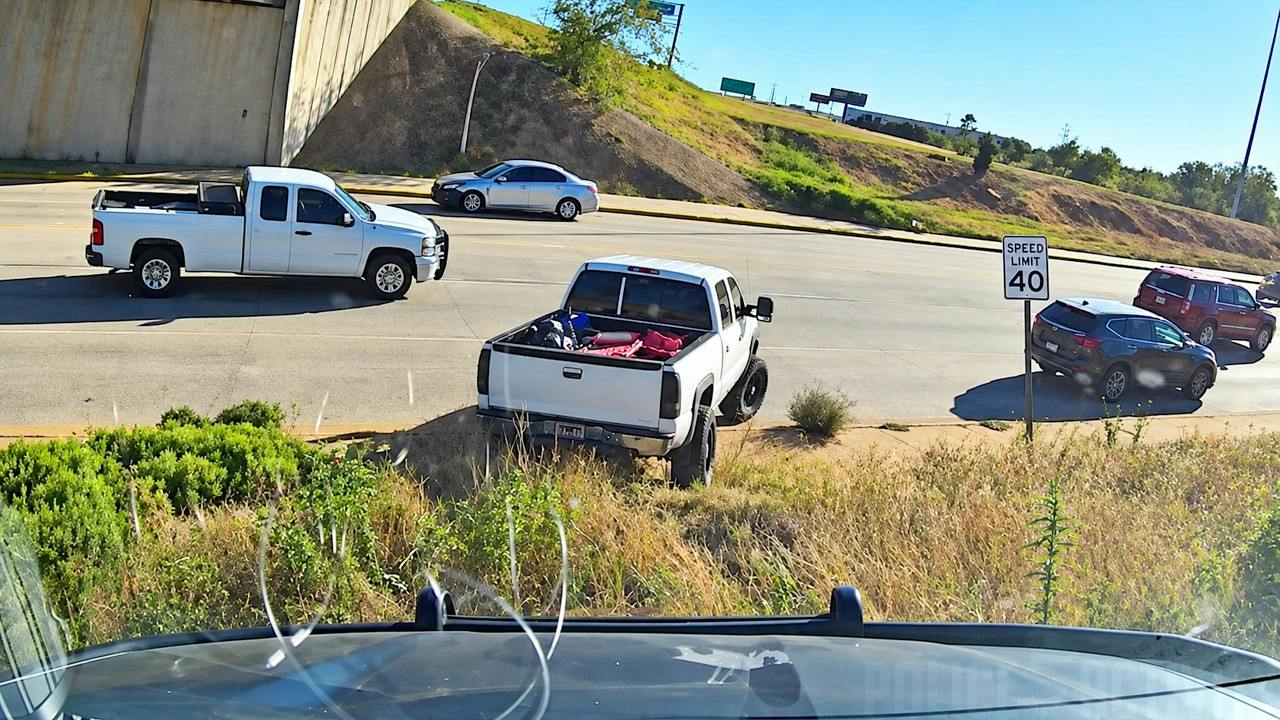 A suspect in a pickup truck tries to escape Oklahoma City police by driving off road