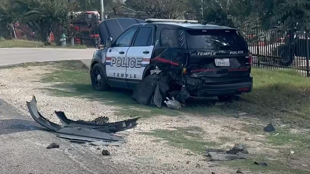 A Temple police cruiser was damaged when a fleeing suspect allegedly crashed into it