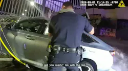 Long Beach police confront an armed suspect after a crash during a high-speed chase that ended in Los Angeles
