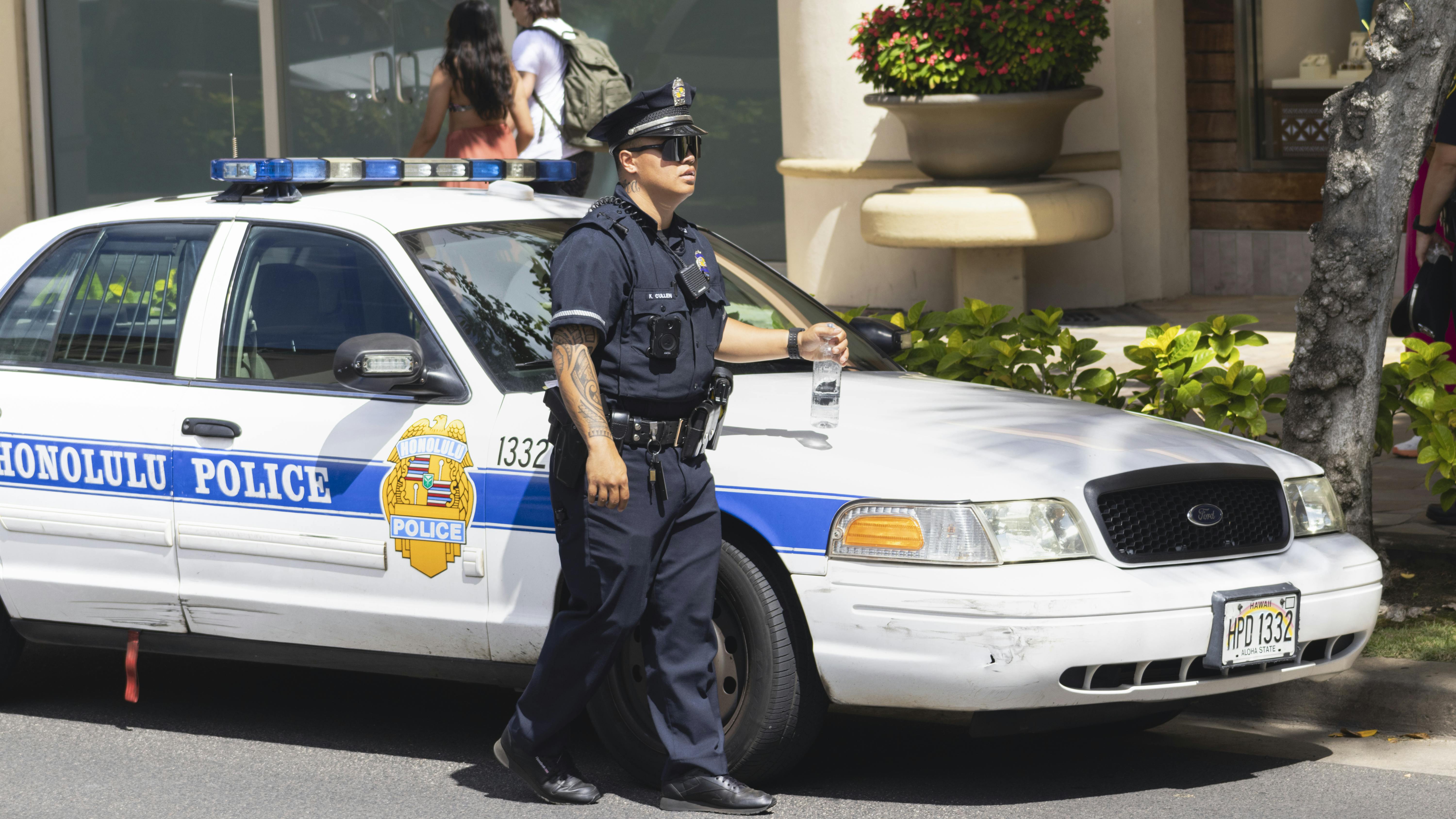 The planned Nov. 1 shift of 100 Honolulu police officers to patrol is under review as the department weighs community concerns against staffing shortages, overtime spending and a major budget gap.