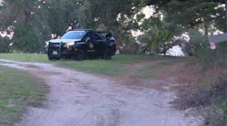 The scene of a shooting that left a Van Zandt County deputy dead and a Canton police officer injured