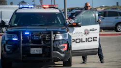 A Ventura police officer exits his SUV