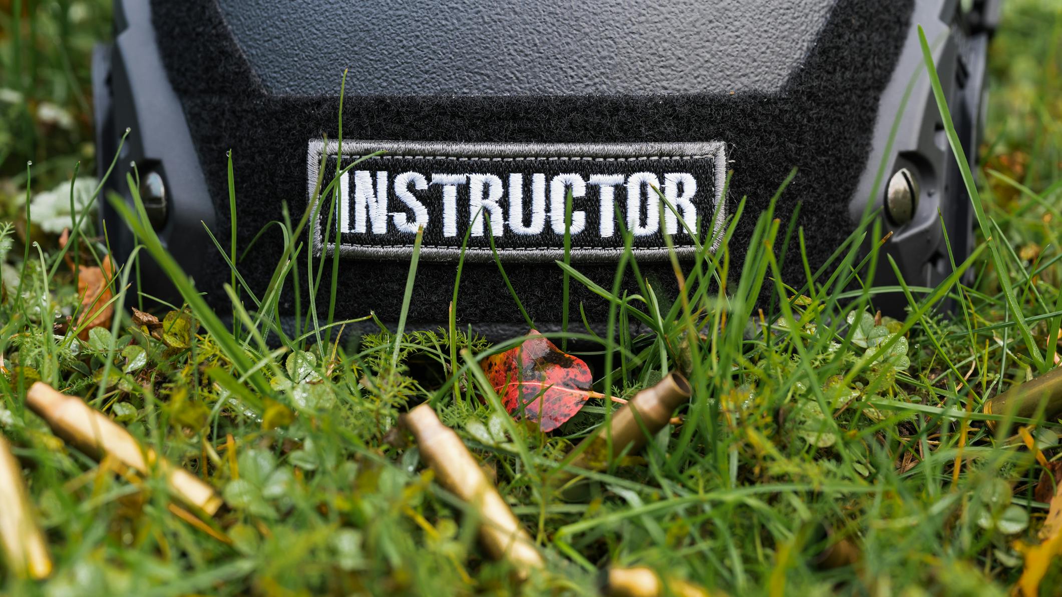 Firearms instructor's helmet among shell casings