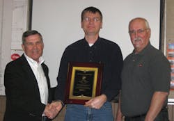 Ron Helson, HCF Executive Director (left), presents the Hart Innovative Achievement Award to We Energies, represented by Todd Go Ron Helson, HCF Executive Director (left), presents the Hart Innovative Achievement Award to We Energies, represented by Todd Go