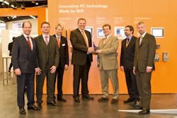 B&amp;R Managing Director Hans Wimmer receives the Intel award at the SPS/IPC/DRIVES exhibition in Nuremberg from Markus Gabler, Cen