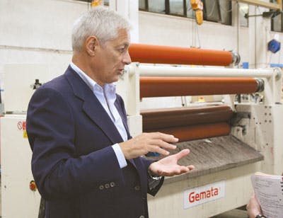 Explaining a roller pigment application machine at Gemata.