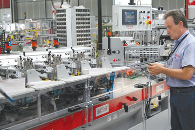 Testing an envelope stuffing machine at Sitma Machinery.