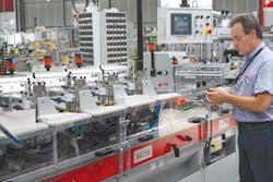 Testing an envelope stuffing machine at Sitma Machinery. Testing an envelope stuffing machine at Sitma Machinery.