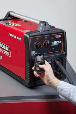 A mobile phone with a camera is being used to scan the 2D Microsoft Tag barcode on a Power MIG 180 to access information about t A mobile phone with a camera is being used to scan the 2D Microsoft Tag barcode on a Power MIG 180 to access information about t
