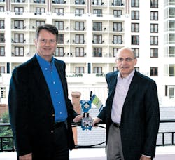 John Berra, (right) Chairman, Emerson Process Management and Steve Sonnenberg, (left) Executive Vice President, Emerson and Busi