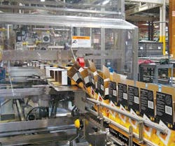 The case erector forms the wine boxes and gently transforms them from their sides to an upright position The case erector forms the wine boxes and gently transforms them from their sides to an upright position