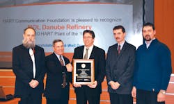 G?bor Bereznai (holding plaque) and others from MOL Danube Refinery accepted the 2010 HART Plant of the Year award early this ye G?bor Bereznai (holding plaque) and others from MOL Danube Refinery accepted the 2010 HART Plant of the Year award early this ye