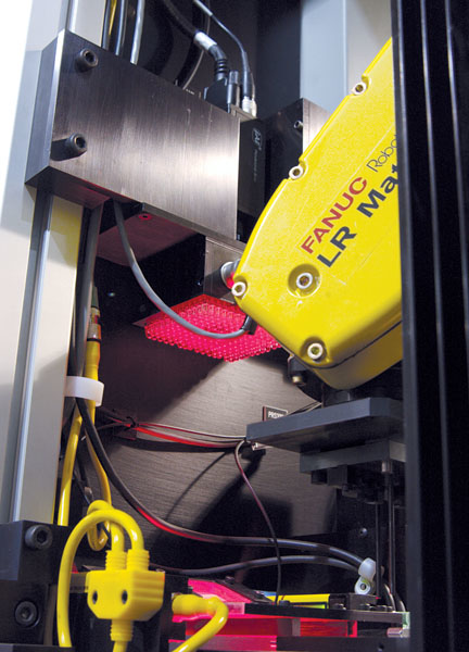 Averna's vision system identifies a part, before a robot grabs the part.