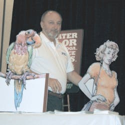 PTO Executive Director Mike Bryant poses with Pretty Polly and Sweet Sue - two characters from PTO&apos;s Profinet brochure.