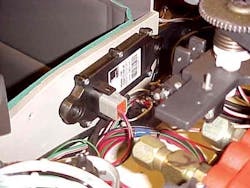 An RFID tag is mounted on a forklift and connected to engine diagnostics. A technician just walks by the forklift and collects d An RFID tag is mounted on a forklift and connected to engine diagnostics. A technician just walks by the forklift and collects d