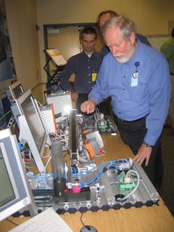 Procter &amp; Gamble engineer David Chappell (foreground) was organizer of the Cincinnati event, which demonstrated the benefits of