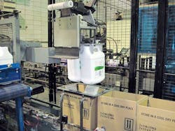 Case packing and palletizing in one small cell (10.5 by 25 ft.) required empty cardboard cases to convey from right to left alon Case packing and palletizing in one small cell (10.5 by 25 ft.) required empty cardboard cases to convey from right to left alon