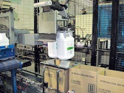 Case packing and palletizing in one small cell (10.5 by 25 ft.) required empty cardboard cases to convey from right to left alon Case packing and palletizing in one small cell (10.5 by 25 ft.) required empty cardboard cases to convey from right to left alon