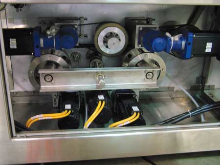 The servo drives and MKD washdown servo motors (above) are part of a control system that uses up to 24 axes of servo control per