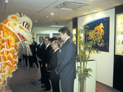 Welcome to the Lion City: Carlo Gavazzi executives were greeted in traditional style at the launch of the regional headquarters