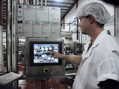 An operator checks the status of the batch on this operator terminal.