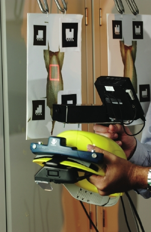 Subjects in the AR lab experiments will use a handheld device to perform a task on chicken cutouts that is similar in complexity