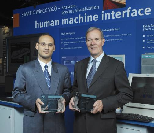 Sandeep Maheshwari (left), Vice President, Industrial & Electronics markets, Frost & Sullivan, presented the awards to Aubert Ma