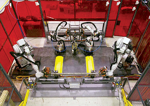 The Axis system uses four Motoman robots.