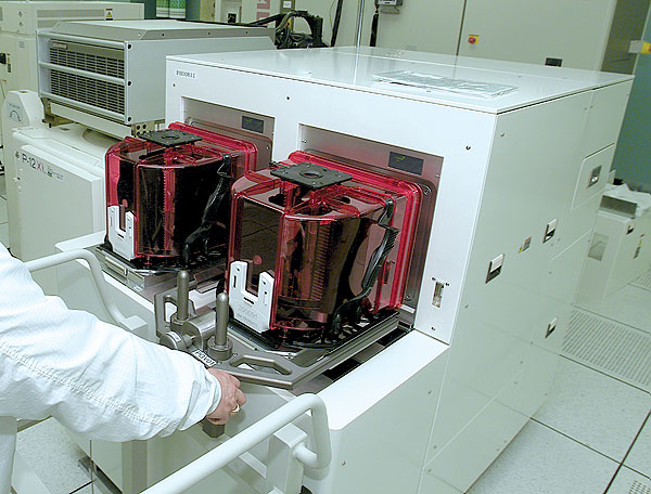 Two front-opening unified pods, or FOUPs, are put through their paces at an IBM test center in the East Fishkill, N.Y., facility